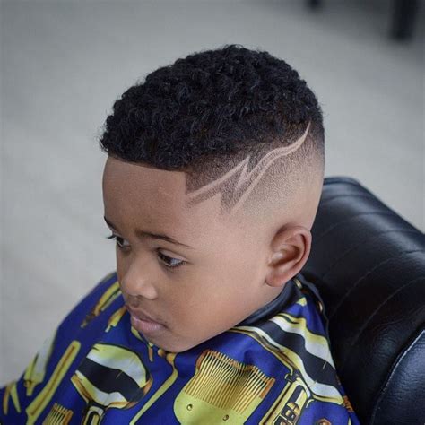 A perfect hairstyle for little black boys not only ensure that they look great, but also that they can play and learn without worrying about their hair getting in their face. Fade for boys | Boys fade haircut