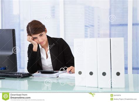 Worried Businesswoman At Desk Stock Image Image Of Calculation