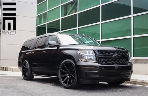 All Black Chevy Suburban On Custom Wheels By Exclusive Motoring