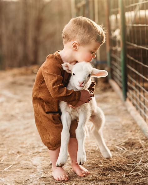 30 Adorable Photos Of Children Interacting With Animals Sporting Abc