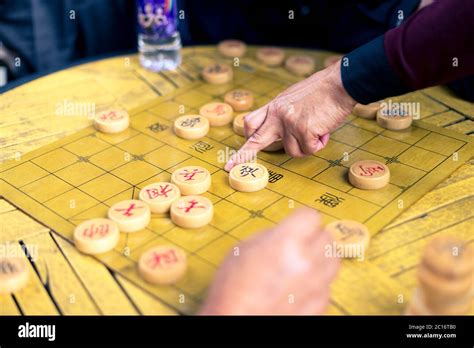 People Playing Chinese Chess In Park Stock Photo Alamy