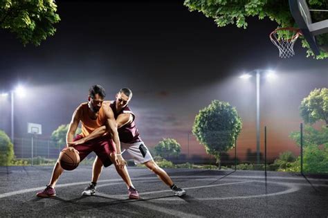 Premium Photo Two Basketball Players Fighting For A Basketball In The