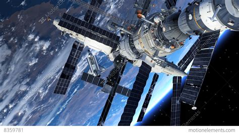 Space Station And Space Shuttle Orbiting Earth Stock