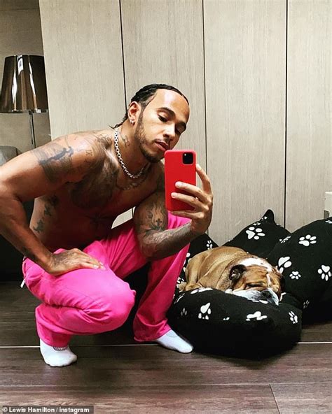 Lewis Hamilton Shows Off His Ripped Physique While Posing In A Pair Of Fluorescent Pink Trousers