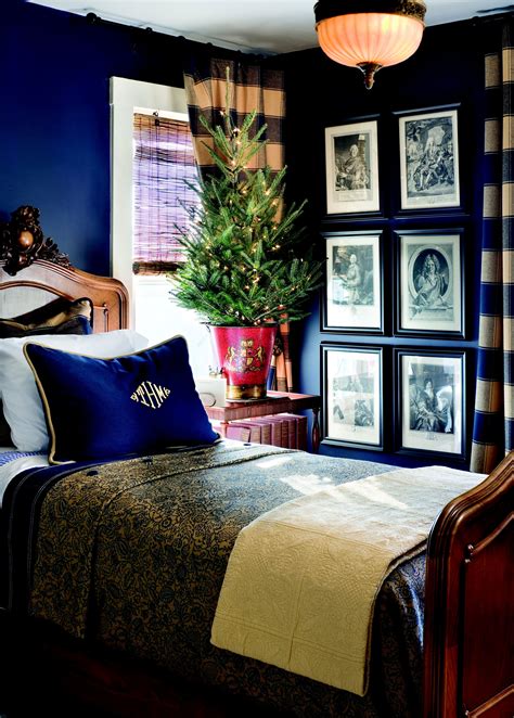 Blue on blue & more blue. Love the navy blue wall color, the headboard, ceiling ...