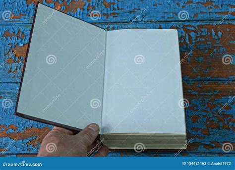 Hand Opens A Book With White Pages Stock Image Image Of Hardcover