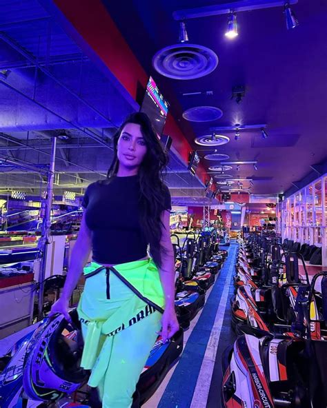 Kim Kardashian Flaunts Her Dangerous Curves And Tiny Waist In Skintight Neon Bodysuit For New