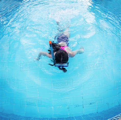 Caucasian Girl Snorkeling In Swimming Pool Stock Photo Dissolve