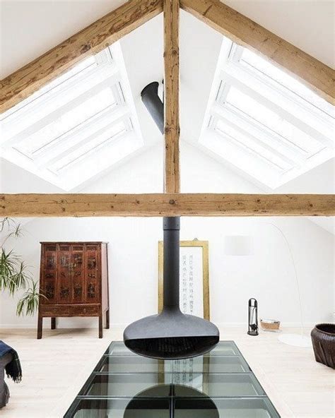 This Triangular Ceiling Supported With The Wooden Beams Is A Really