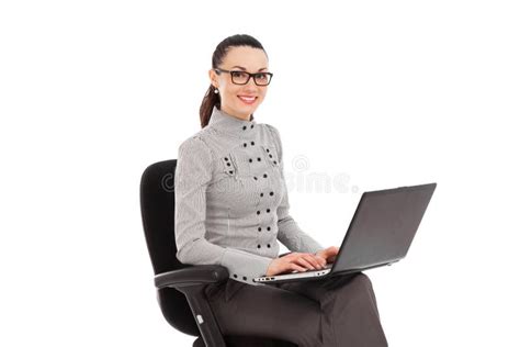 Businesswoman Sitting In The Office Chair With Laptop Talking On Stock