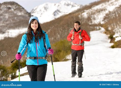 Couple Hiking In Snowy Mountain Stock Image Image Of Adventure