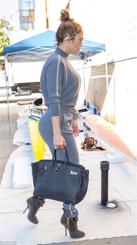 Photos Jennifer Lopez Shows Off Her Famous Curves In Gray Sweatpants As She Heads To The Studio