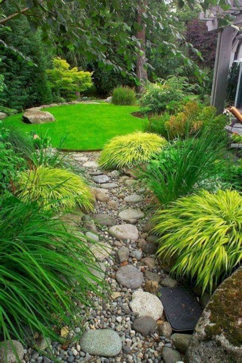 A rain garden features a basin with an entry and exit point for harvested rain water. 75 Beautiful Rain Garden You Should Have In Your Home ...