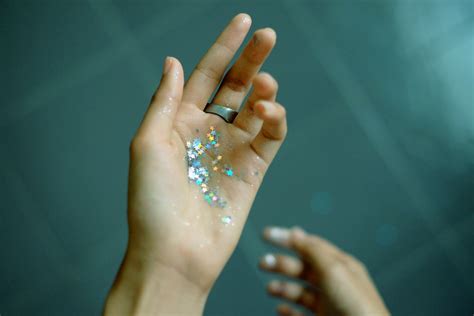 Person Showing Hands With Glitters Photo Free Glitter Image On Unsplash