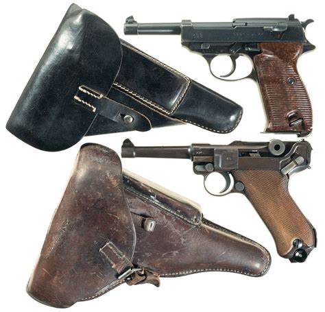 Two German Military Semi Automatic Pistols With Holsters A Walther