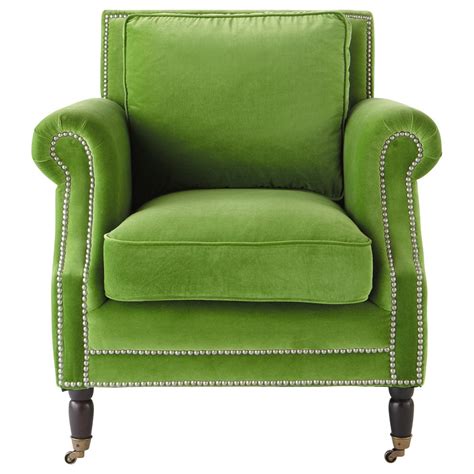 The material catches the light beautifully, creating a real focal point in any rooms it's used in. Velvet armchair in green Baudelaire | Maisons du Monde