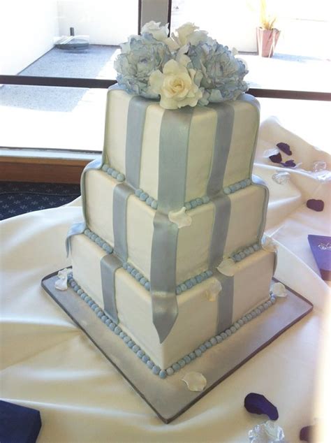 3 Tier Square Fondant Wedding Cake With Ribbon Details And Blue