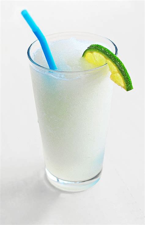 Best free cooking recipes that contain frozen limeade concentrate. Frozen Coconut Limeade Recipe shewearsmanyhats.com #lime # ...