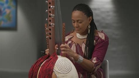 playing the complex west african instrument called the kora wghn