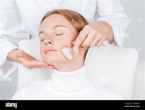Face Massage Beautiful Woman Having Facial Beauty Treatment Cosmetologist Massaging Chin With