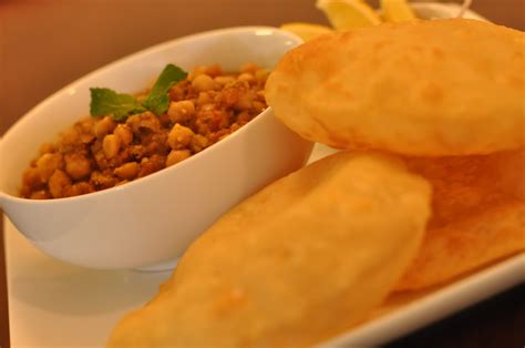 The crispy puffed bhatura makes an excellent combo with hot & spicy chole / chickpeas curry. Spice Infused: Mint Chole with Homemade Bhature