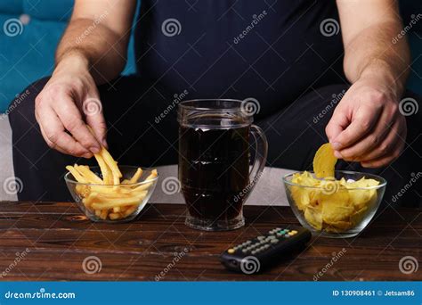 Overweight Man With Tv Remote Junk Food And Beer Stock Image Image