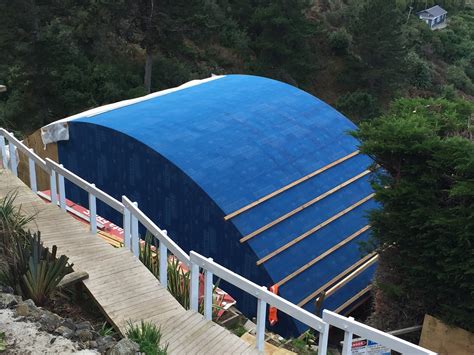 Unique Curved Roof Protected with High-Performance Building Wrap - EBOSS