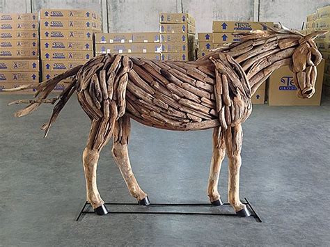 A Life Size Standing Horse Crafted From Teak Wood Chipsscraps Teak