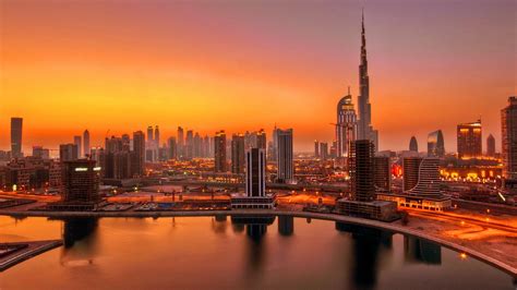 Uae Dubai Skyscrapers In Sunset Wallpaper Wallpaper