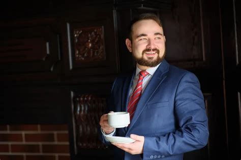 Rich Successful Handsome Man In A Suit Drinking Coffee Stock Image