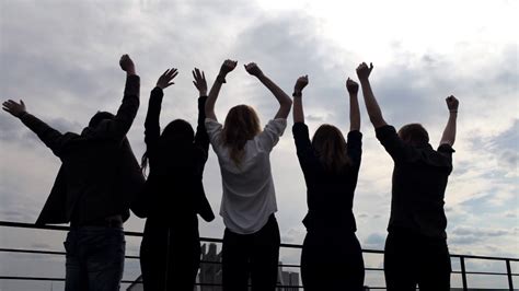 Silhouette Of Group Of People Raising Hands Stock Footage Sbv 315632669 Storyblocks