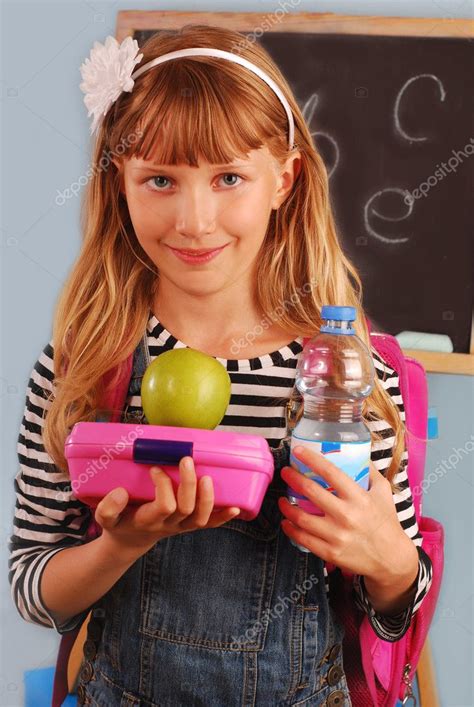 Schoolgirl With Lunch Box Stock Photo By ©teresaterra 6274333