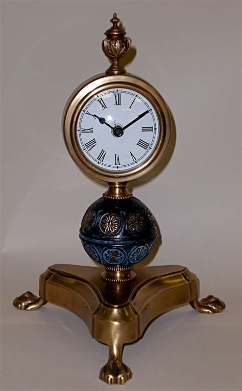 Handecor has a wide range of brass home decor items. Antique Brass & Black Footed Clock Home Decor