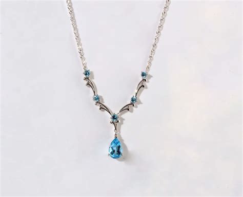 14k White Gold Ladies Blue Topaz Y Necklace Brownes Jewelers