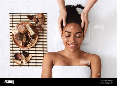 Relaxed African Girl Having Head Massage Over White Stock Photo Alamy