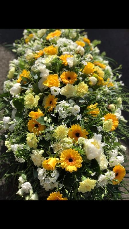 Yellow And White Casket Spray Buy Online Or Call 0121 706 2905