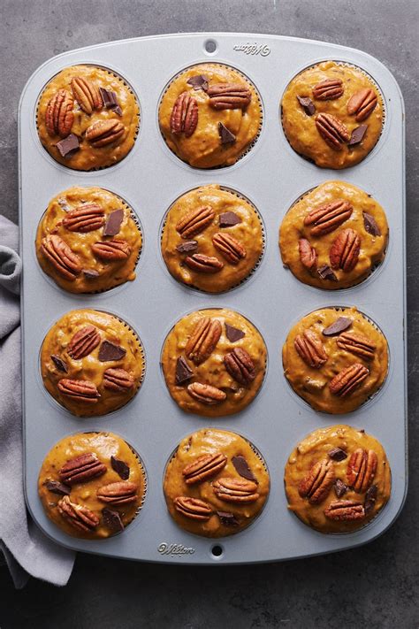 Bakery Style Pumpkin Muffins With Pecans And Chocolate Chunks