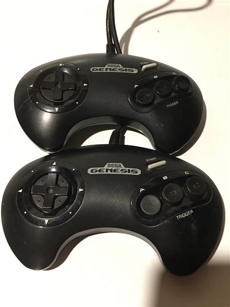 Two Sega Genesis Controllers - iCommerce on Web