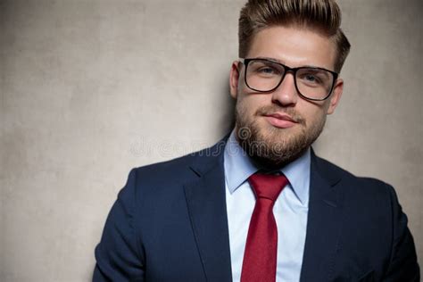 Businessman Standing And Staring At Camera Serious Stock Photo Image