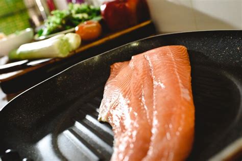 Premium Photo Pink Salmon Fillet In A Frying Pan Before Cooking It