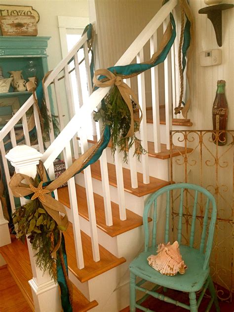 Read on to learn the best coastal decorating ideas that will make you glad to stay home when you can't hit the beach. @ the beach: More Coastal Themed Christmas Decor