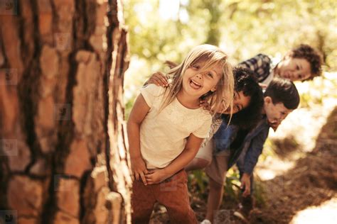 Kids Playing Hide And Seek In A Park Stock Photo 173615 Youworkforthem