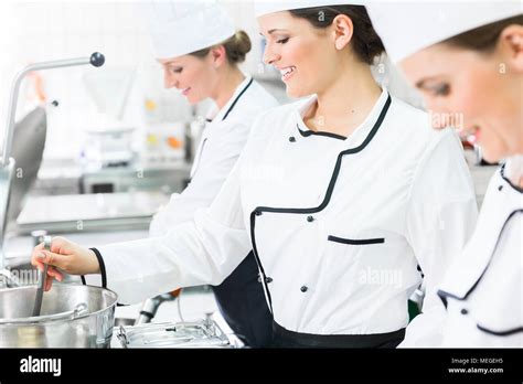 Female Chefs At Work In System Catering Stock Photo Alamy