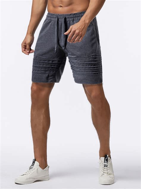 Mens Pocket Elastic Waist Solid Color Drawstring Loose Shorts Sport