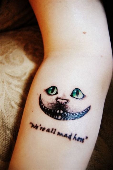 If you wish to have a tiny cat. Gorgeous green eye of cat quote tattoo on arm ...