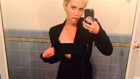 Miley Cyrus Flashes Bosom During Photoshoot Indiatv News India Tv