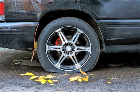 Flat Tire Of A Rusty Old Dark Car Flat Tire Tire Car