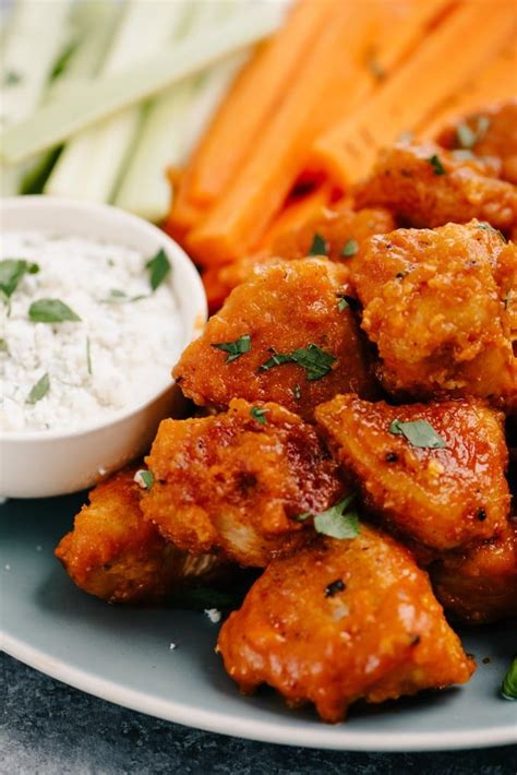 Making this air fryer boneless buffalo wing recipe is as easy as slicing your chicken, battering your meat, popping them into the air fryer and dressing them for best results lightly toss the chicken in the sauce with a spoon to avoid breaking up the crisp exterior. Buffalo Chicken Bites (Boneless Buffalo Wings) | Recipe ...
