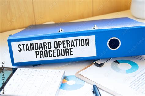 Standard Operation Procedure Words On Labels With Document Binders