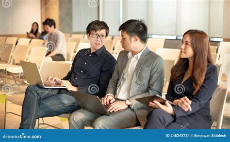 Asian Colleagues Discussing In Conference Room Stock Photo Image Of